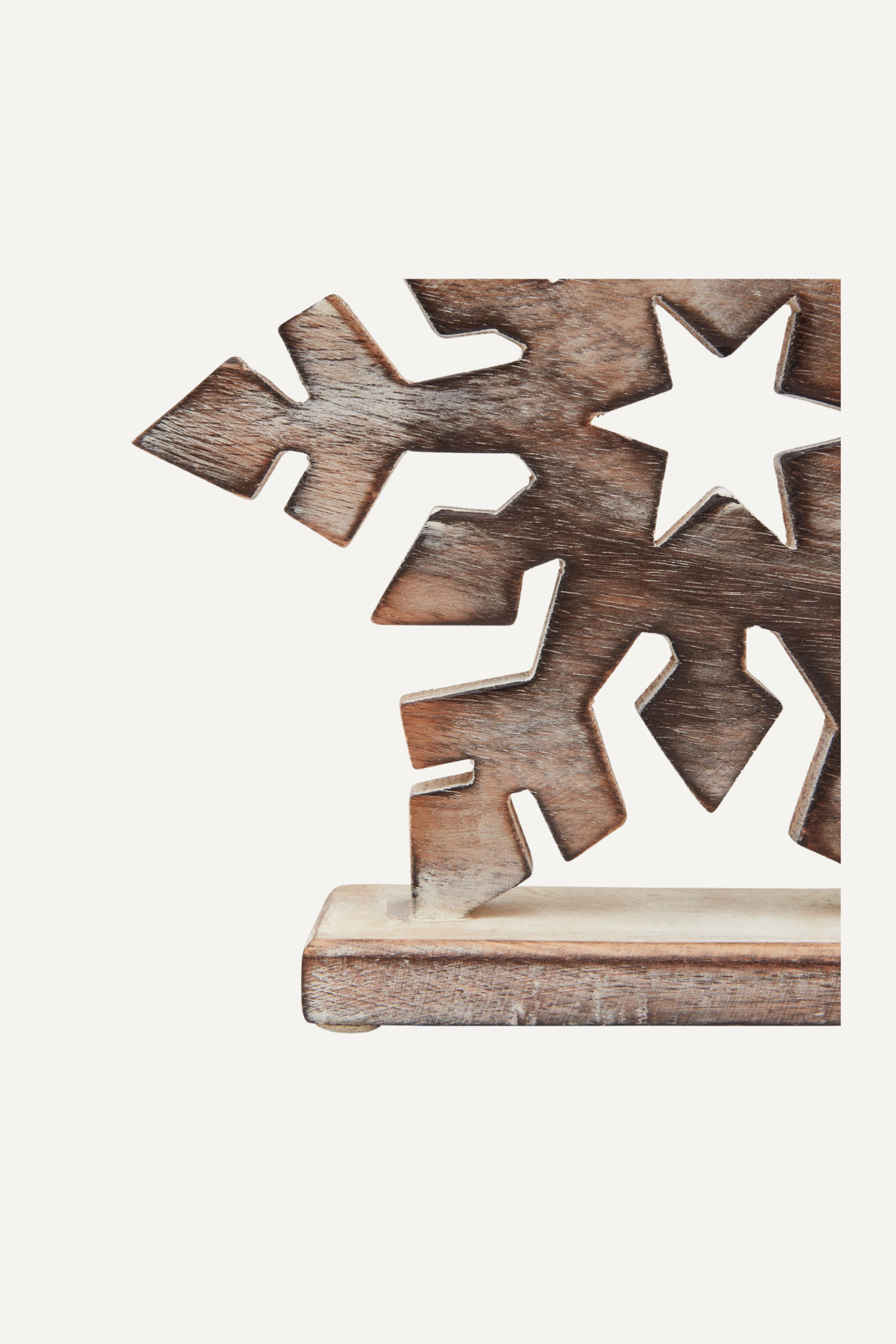 Up close of wooden snowflake decoration