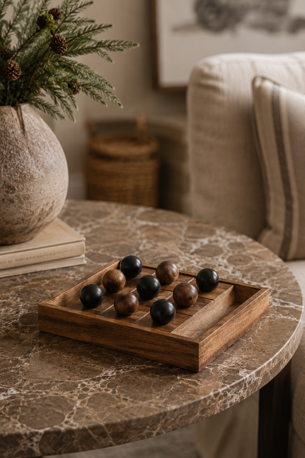 Wooden Tic Tac Toe Game on brown marble coffee table