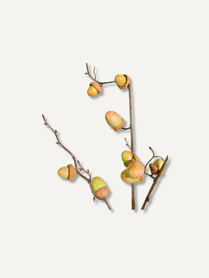up close of faux green acorn branch