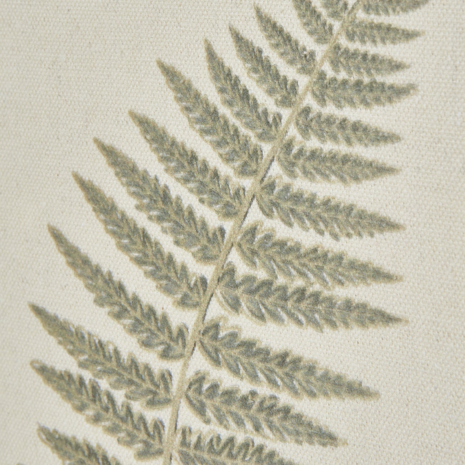 up close of tapestry detail on fern framed art work