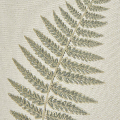 up close of tapestry detail on fern framed art work