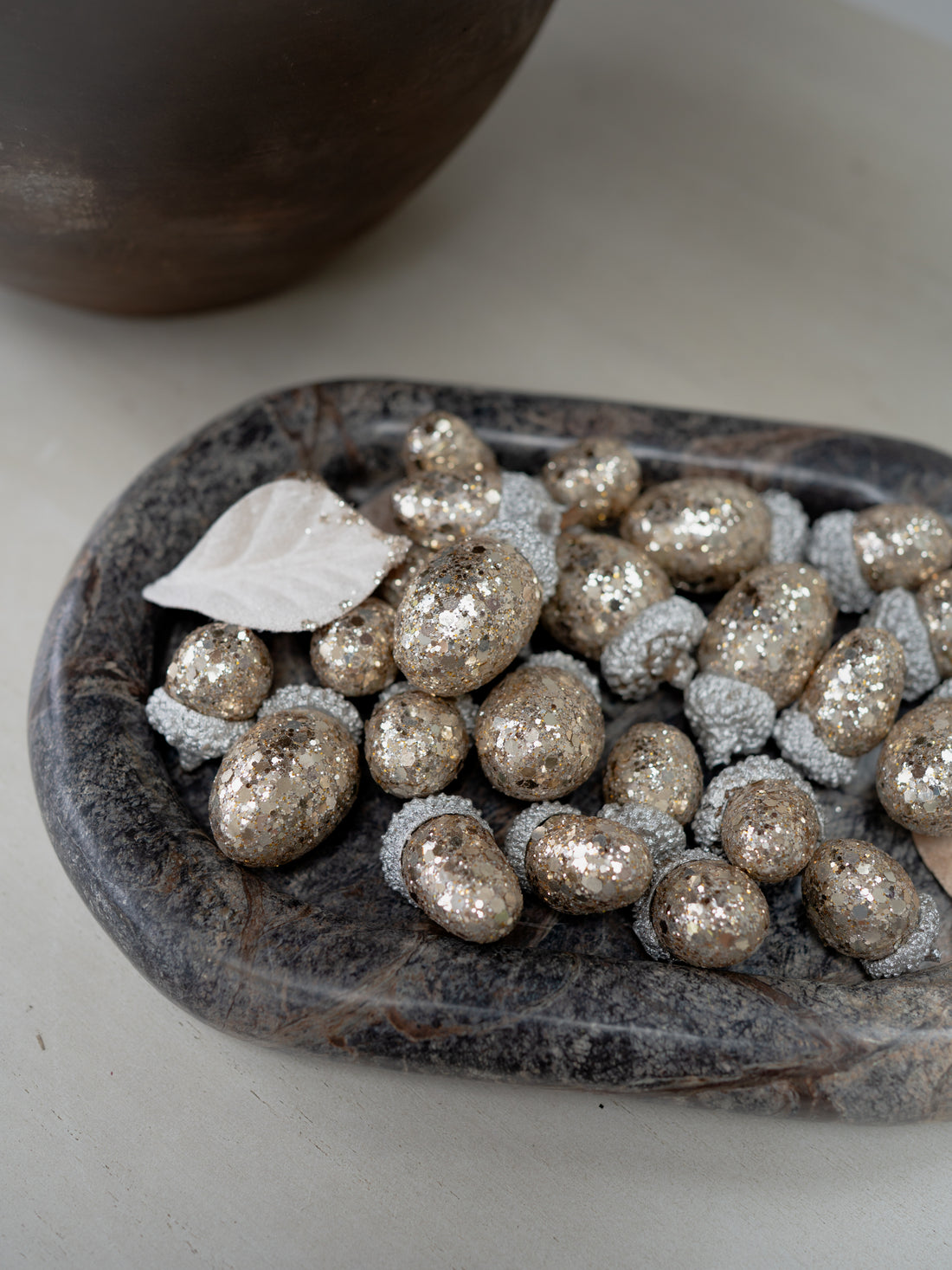 golden glittered acorns
