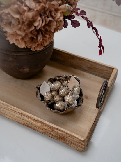 golden glittered acorns