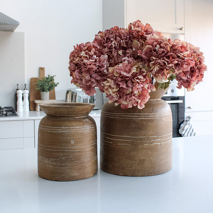 faux pink dried hydrangeas in rustic brown vase