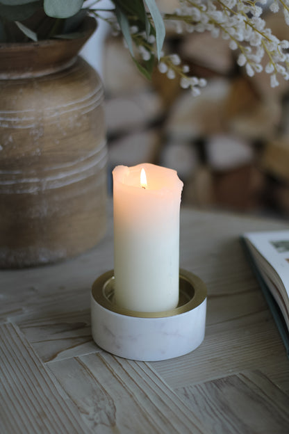 marble inspired candle holder with gold inner perfect for coffee table styling with a pillar candle